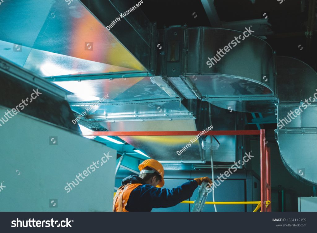 stock-photo-young-man-in-orange-work-vest-safety-belt-and-hard-hat-going-to-repair-hvac-system-toned-1361112155